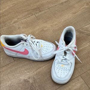 Nike Force 1 Kids Sneakers in White with Pink and Yellow Accents